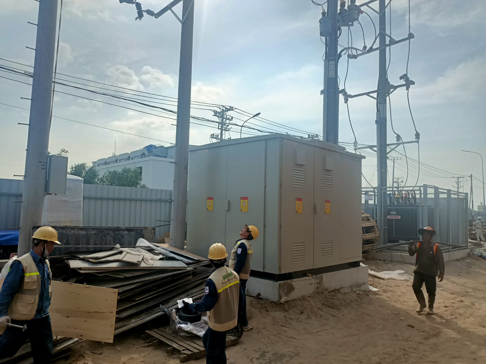Maintenance of an electrical panel by technicians.