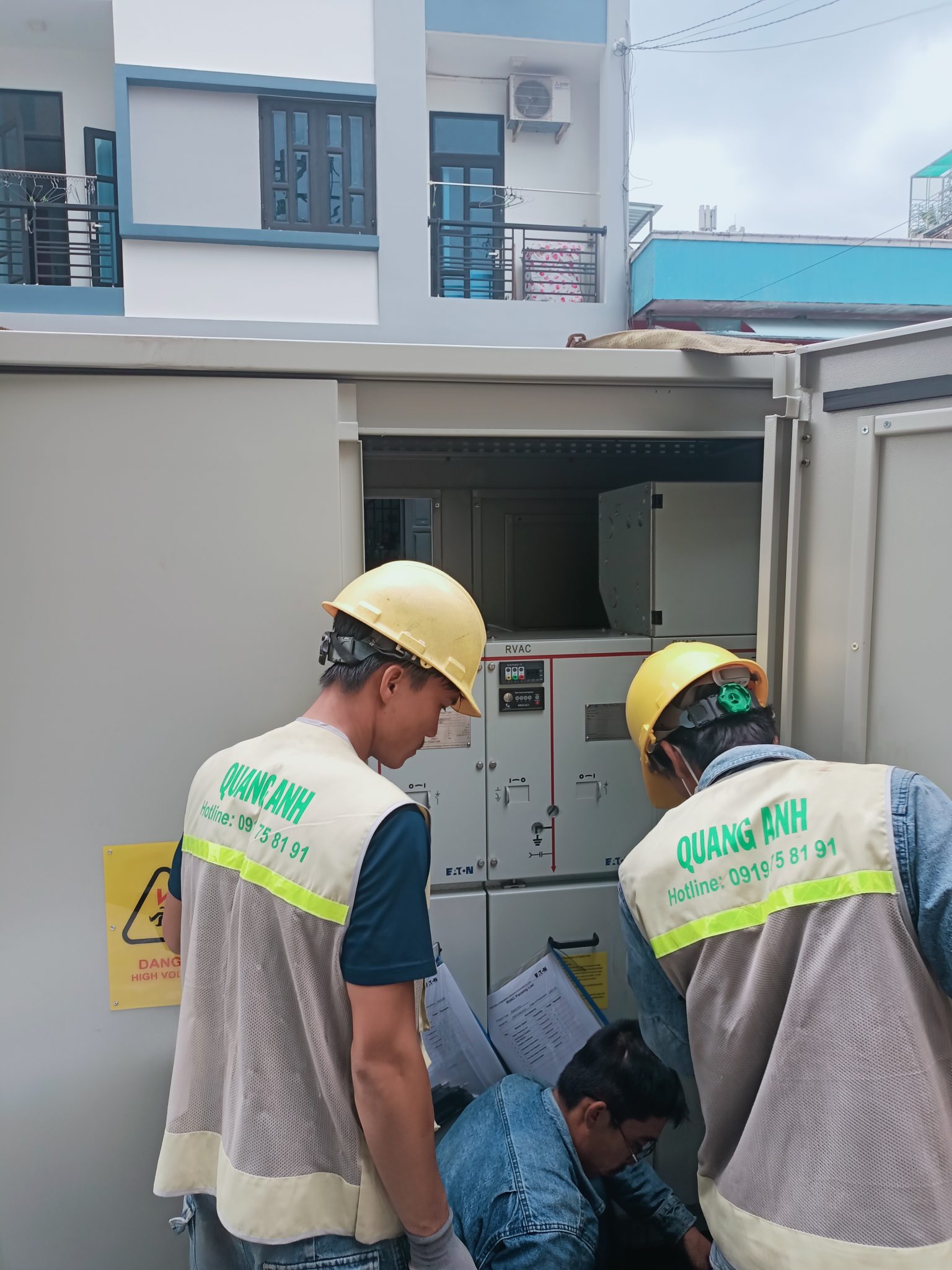 Employee inspecting solar panels