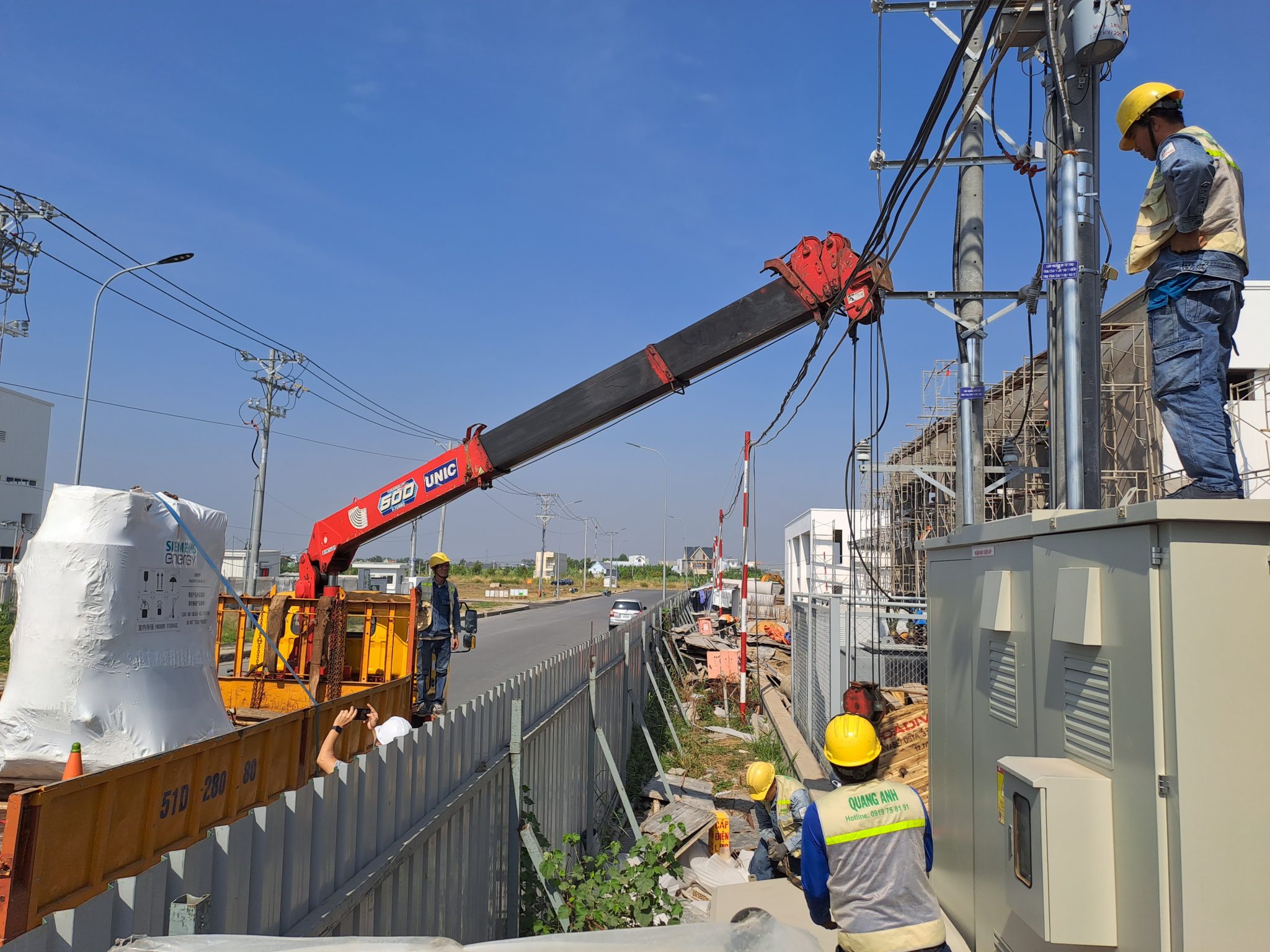 QuangAnhcons' team at an electrical project site.