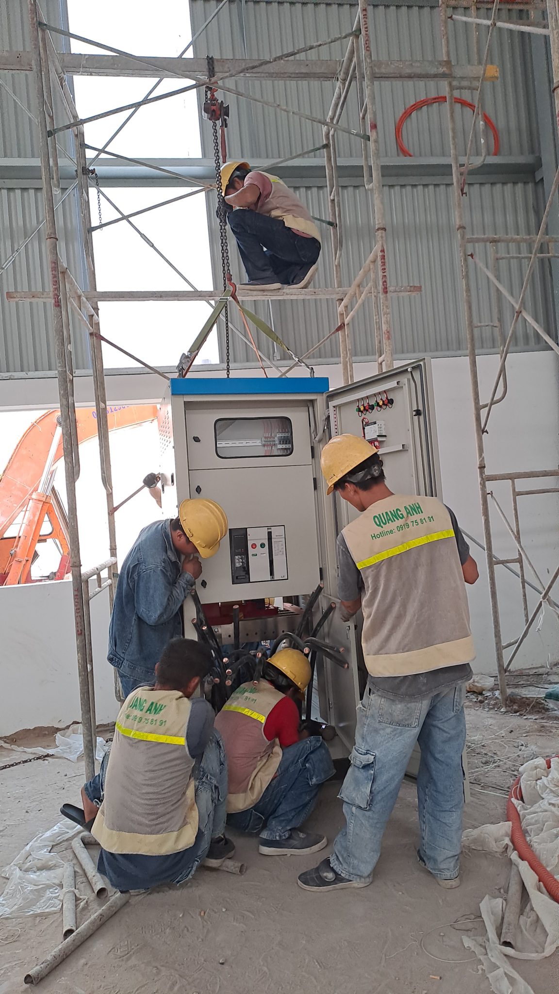 Key elements of the solar power installation team. Solar power contractors reviewing documentation.