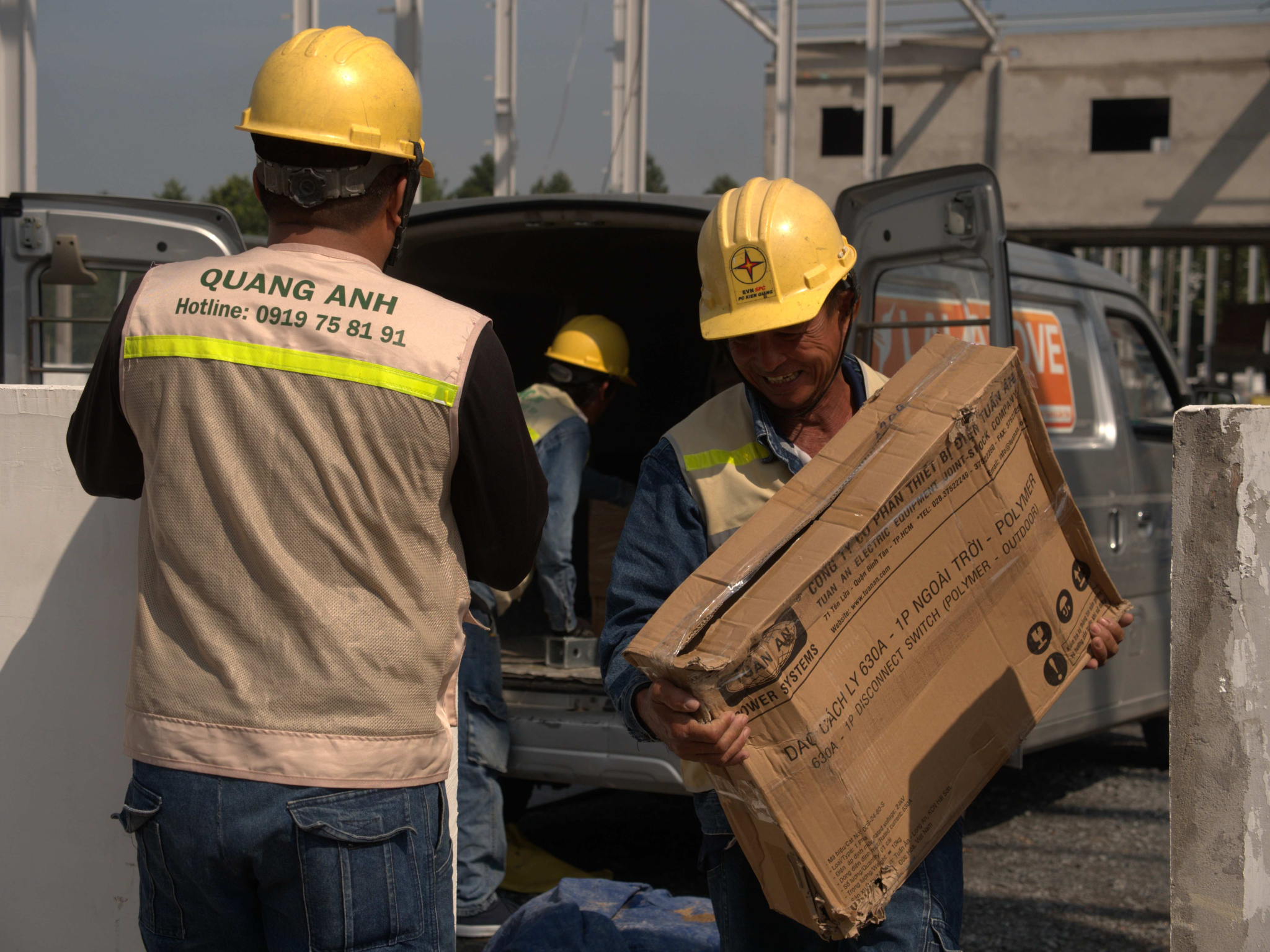 Industrial Electrical Maintenance Service. Technician maintaining factory electrical system.