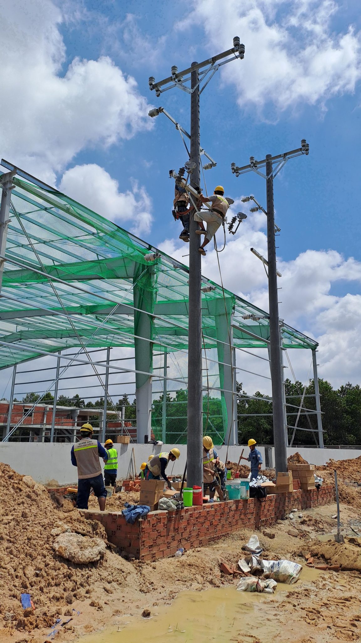 Industrial electrical maintenance Maintenance staff inspecting industrial electrical panels