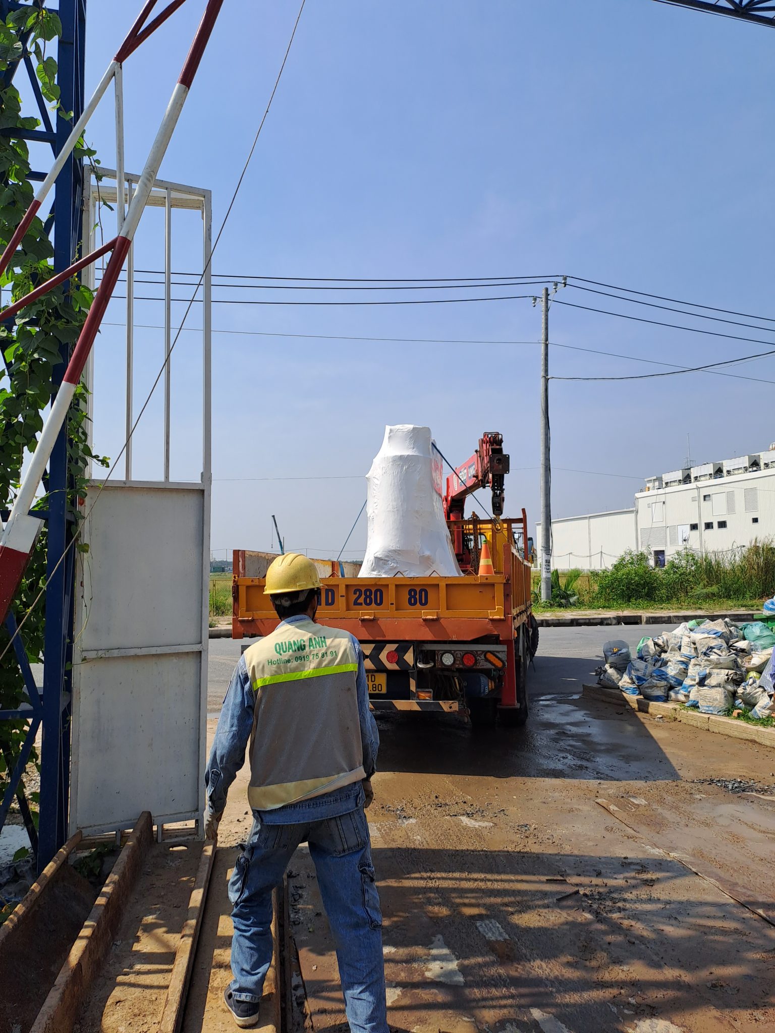 QuangAnhcons Electrical Implementation QuangAnhcons workers installing an electrical system.