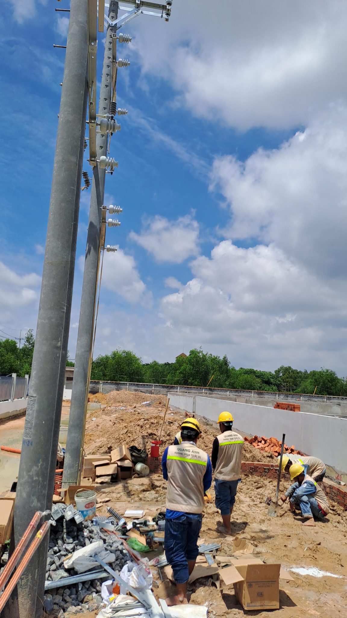 Industrial Electrical Systems by QuangAnhcons Workers implementing industrial electrical systems