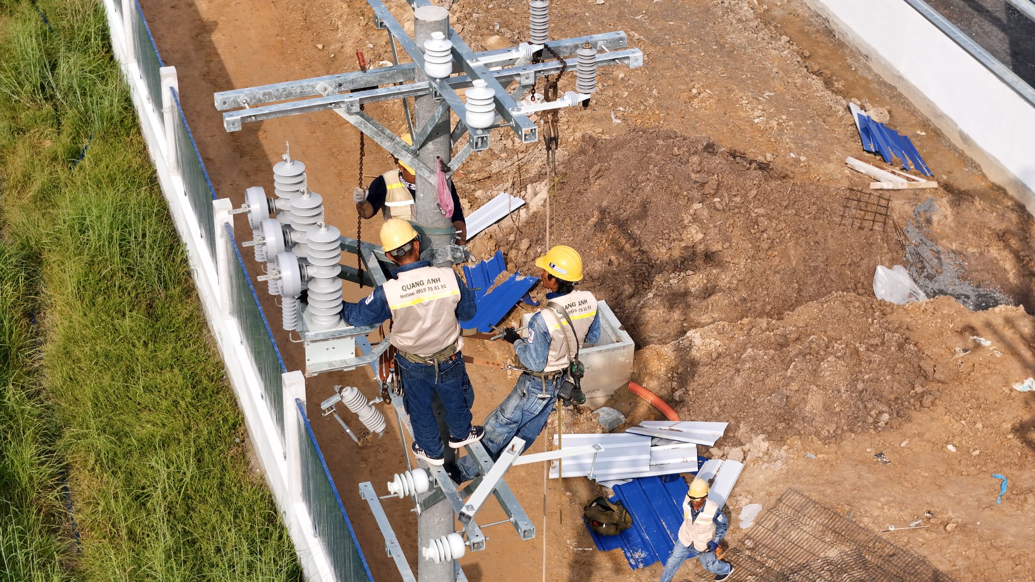 Technician maintaining industrial plant electrical systems.