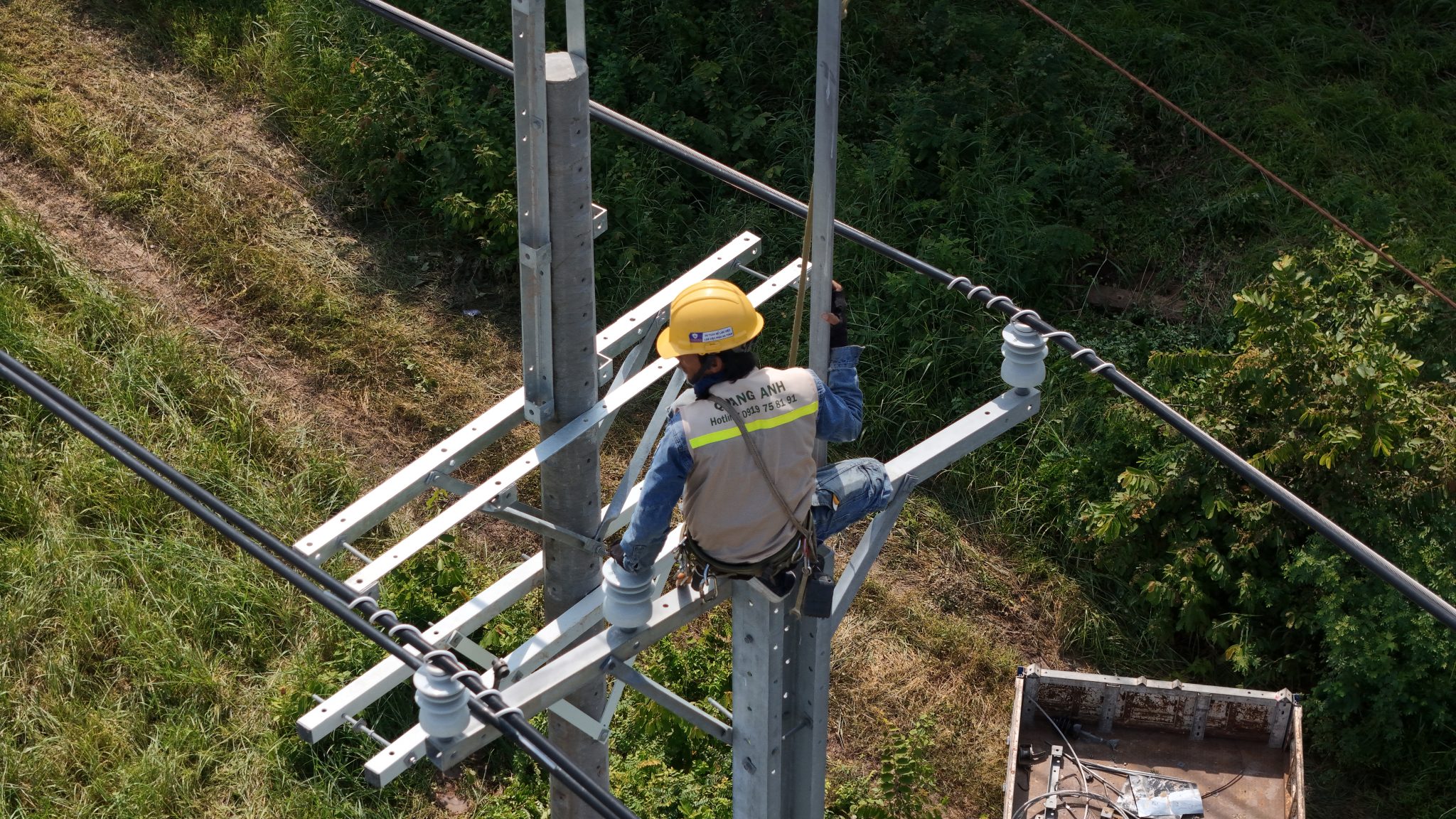 Engineer maintaining wind turbine.
