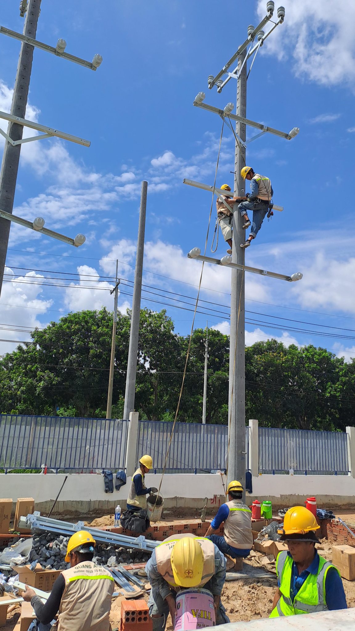 Workers installing solar power system.