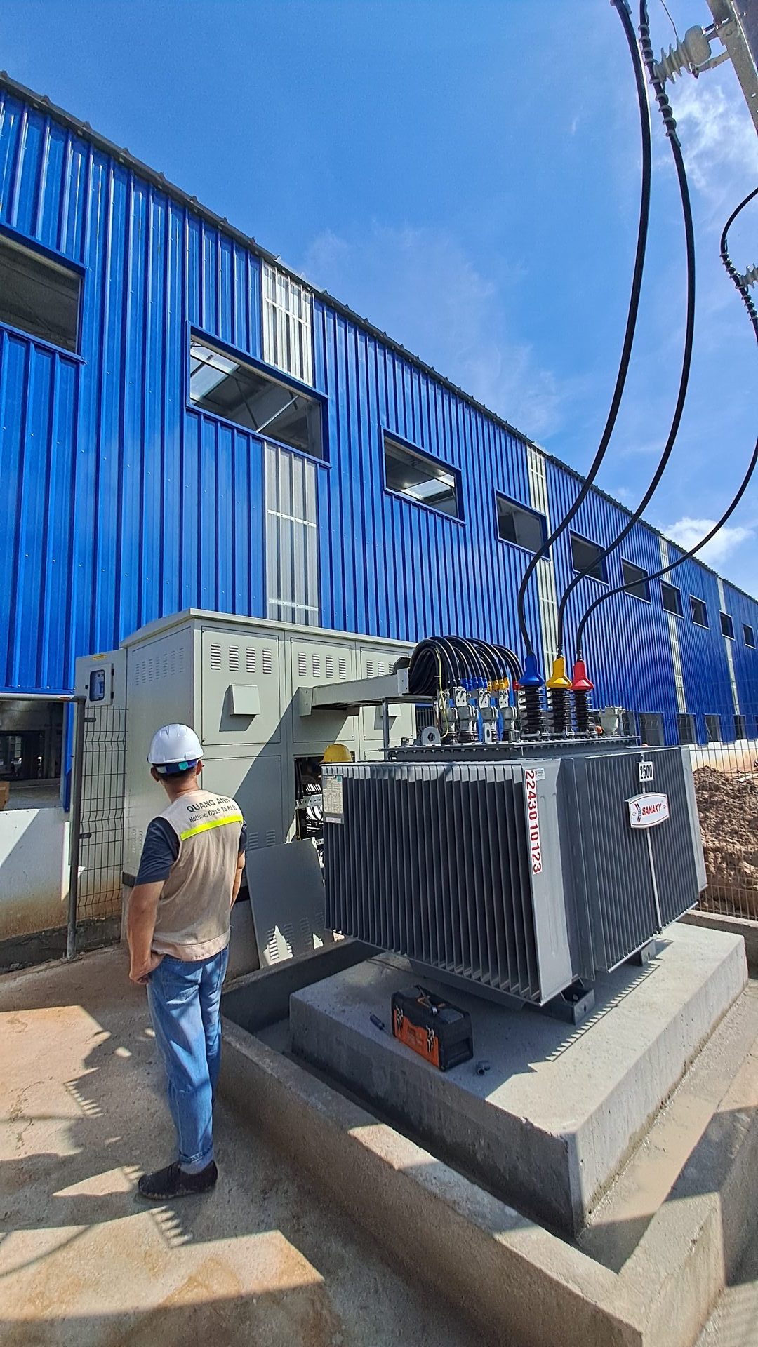 QuangAnhcons archive showing an outdoor transformer, adjacent cabinet and cable connections