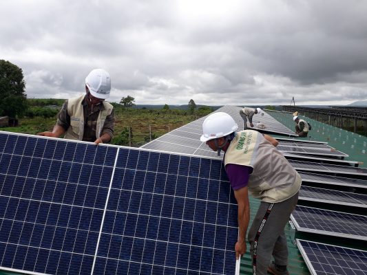 QuangAnhcons archive photograph of rooftop photovoltaic modules during installation